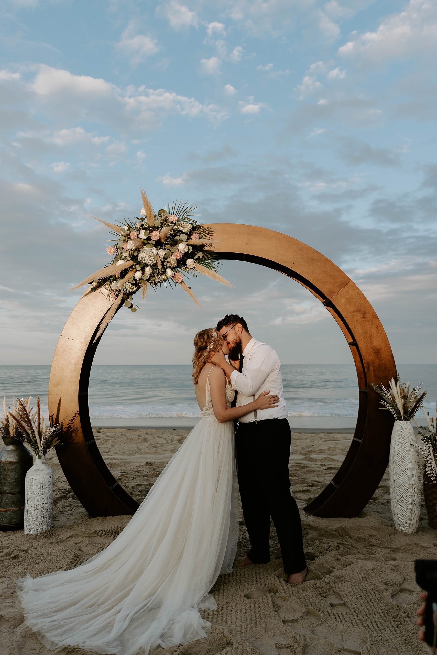 first kiss at wedding ceremony