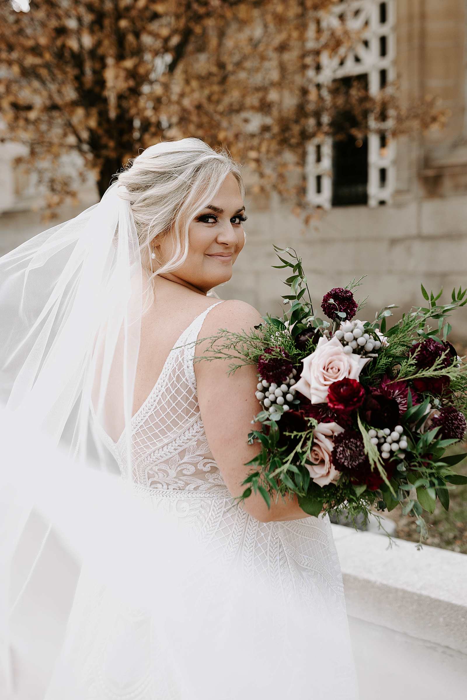 bridal portraits; winter wedding floral design
